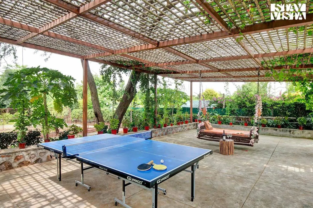 Stayvista's Glasshouse: Orchard Farmstay with Pool and Relaxation Gurgaon