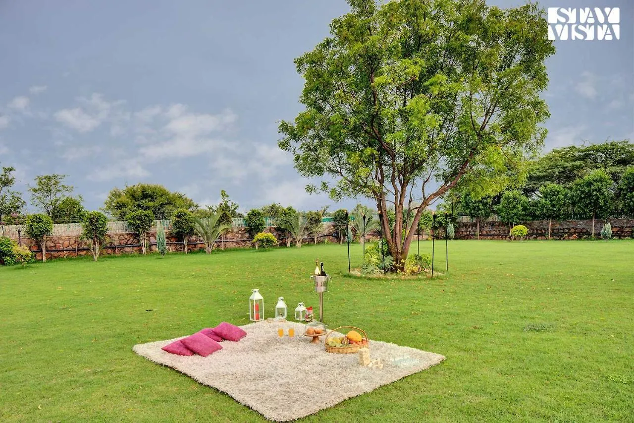 Villa Stayvista's Glasshouse: Orchard Farmstay with Pool and Relaxation Gurgaon