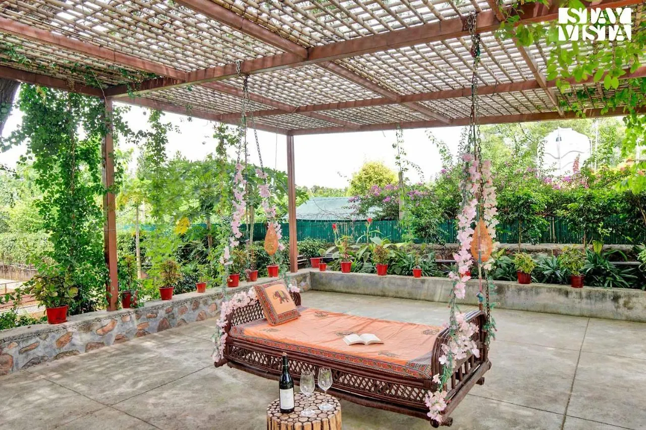 Villa Stayvista's Glasshouse: Orchard Farmstay with Pool and Relaxation Gurgaon India
