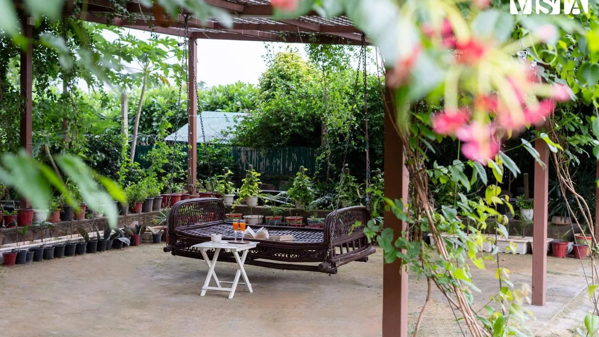 Stayvista's Glasshouse: Orchard Farmstay with Pool and Relaxation Gurgaon India