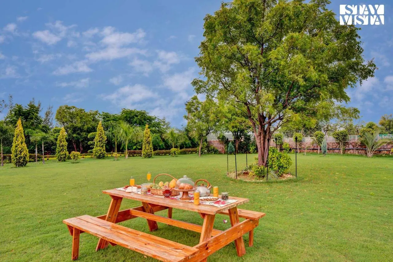 Villa Stayvista's Glasshouse: Orchard Farmstay with Pool and Relaxation Gurgaon