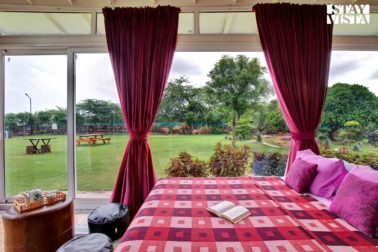 Stayvista's Glasshouse: Orchard Farmstay with Pool and Relaxation Gurgaon